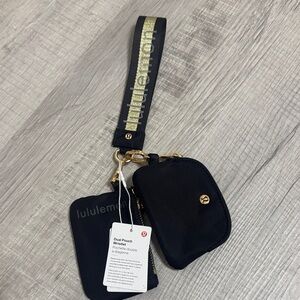 lululemon athletica Black and Gold Wristlet